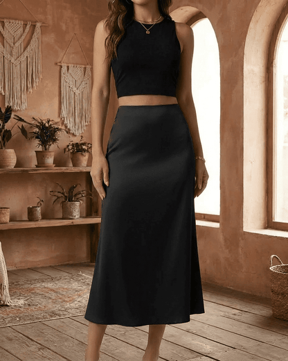 Noirelle Midi Skirt by Lauven - Sleek satin mermaid midi skirt in black, perfect for timeless elegance.
