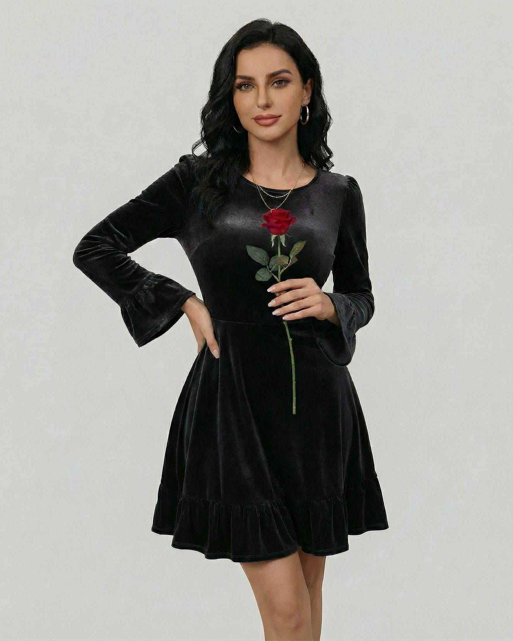 Model wearing Noirvale Mini Dress by Lauven, showcasing its long sleeve A-line silhouette in black velvet.