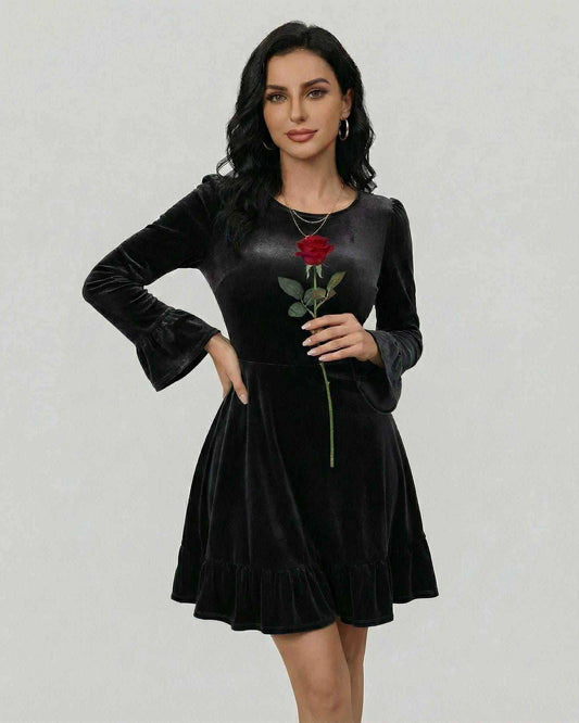 Model wearing Noirvale Mini Dress by Lauven, showcasing its long sleeve A-line silhouette in black velvet.