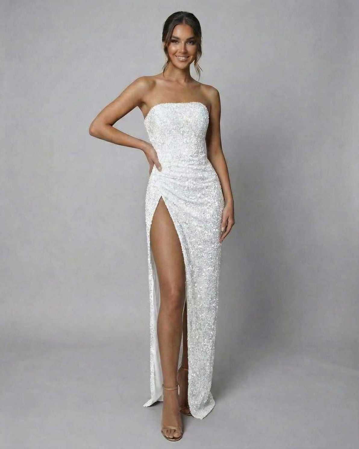 Nova Maxi Dress by Lauven, stunning white sequin strapless gown with high side slit, perfect for elegant occasions.