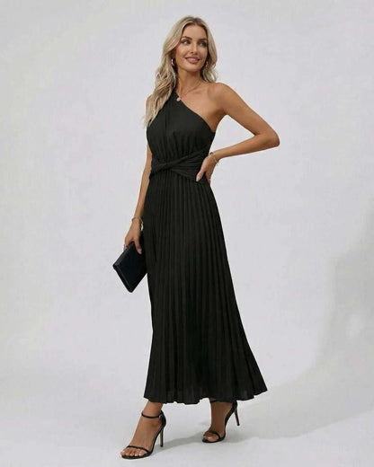 Image of the Nova Midi Dress by Lauven featuring a one-shoulder twist front and pleated hem, perfect for elegant evening wear.