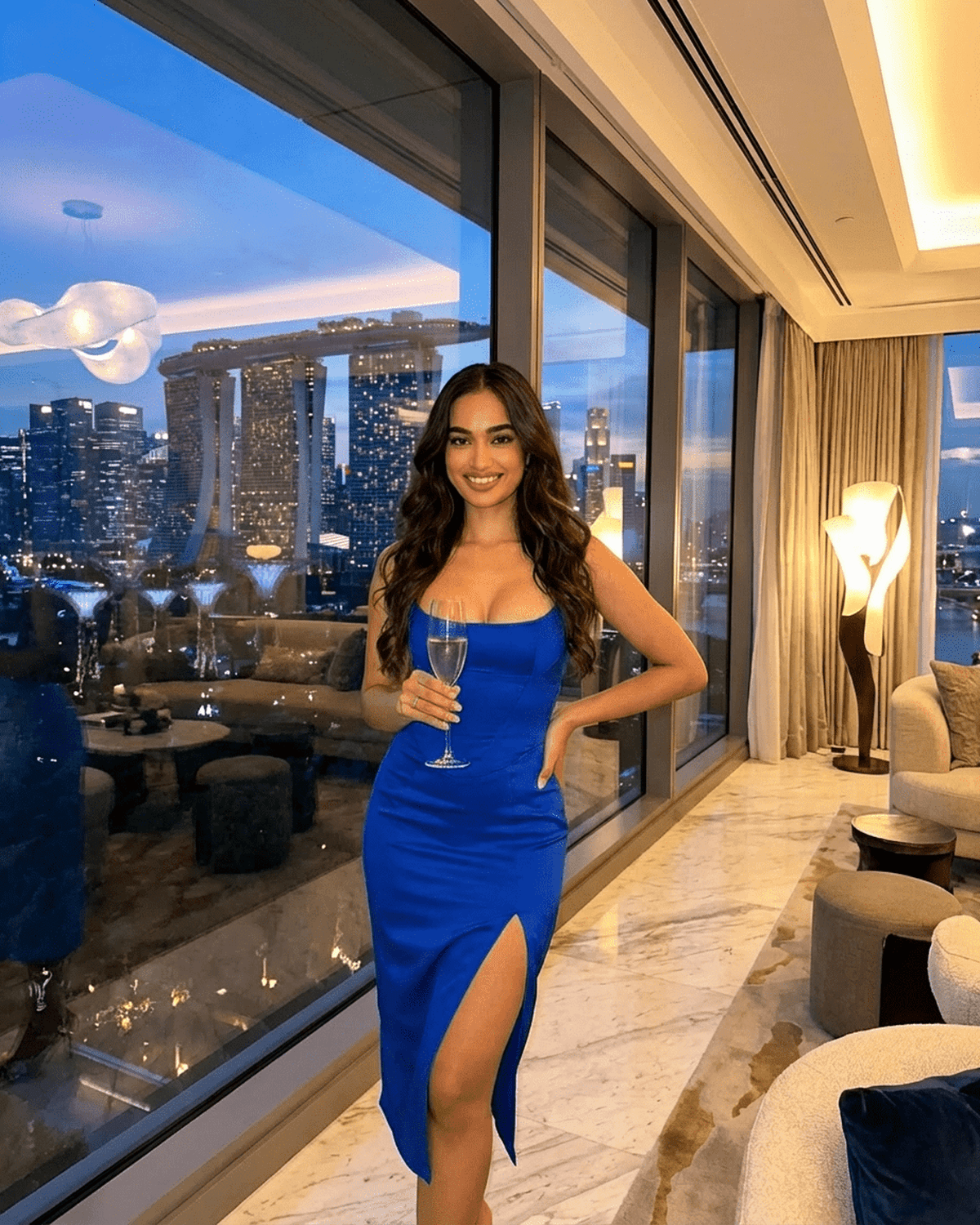 Nova Midi Dress by Lauven, a stunning blue bodycon dress with a high slit, perfect for elegant summer events.