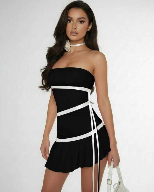 Nova Mini Dress by Lauven featuring satin ribbon detailing and a flared ruffle hem in classic black.