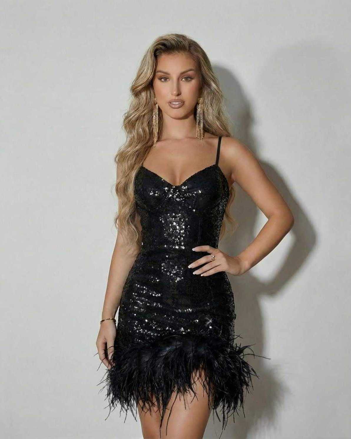 Nova Mini Dress by Lauven featuring sequins and feather hem for a glamorous look.