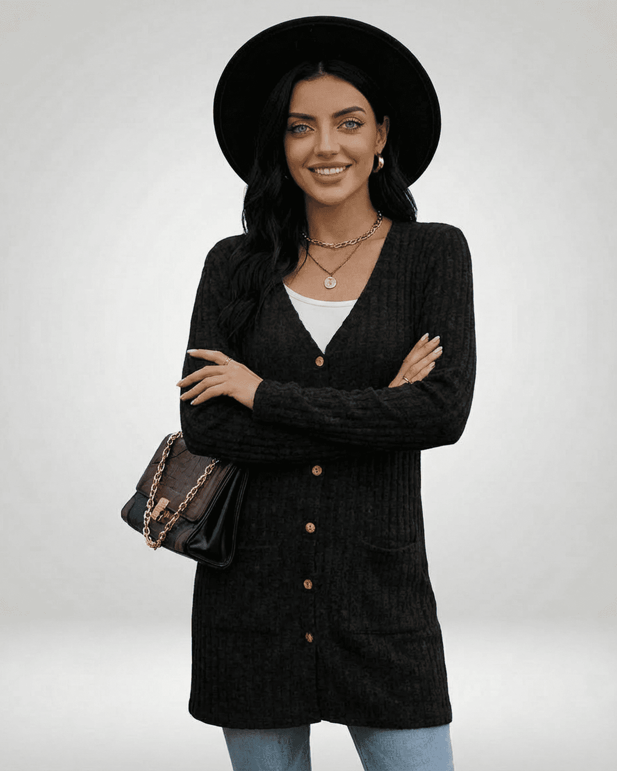 Model wearing a Nyx Cardigan by Lauven, showcasing its longline silhouette and button-front design.