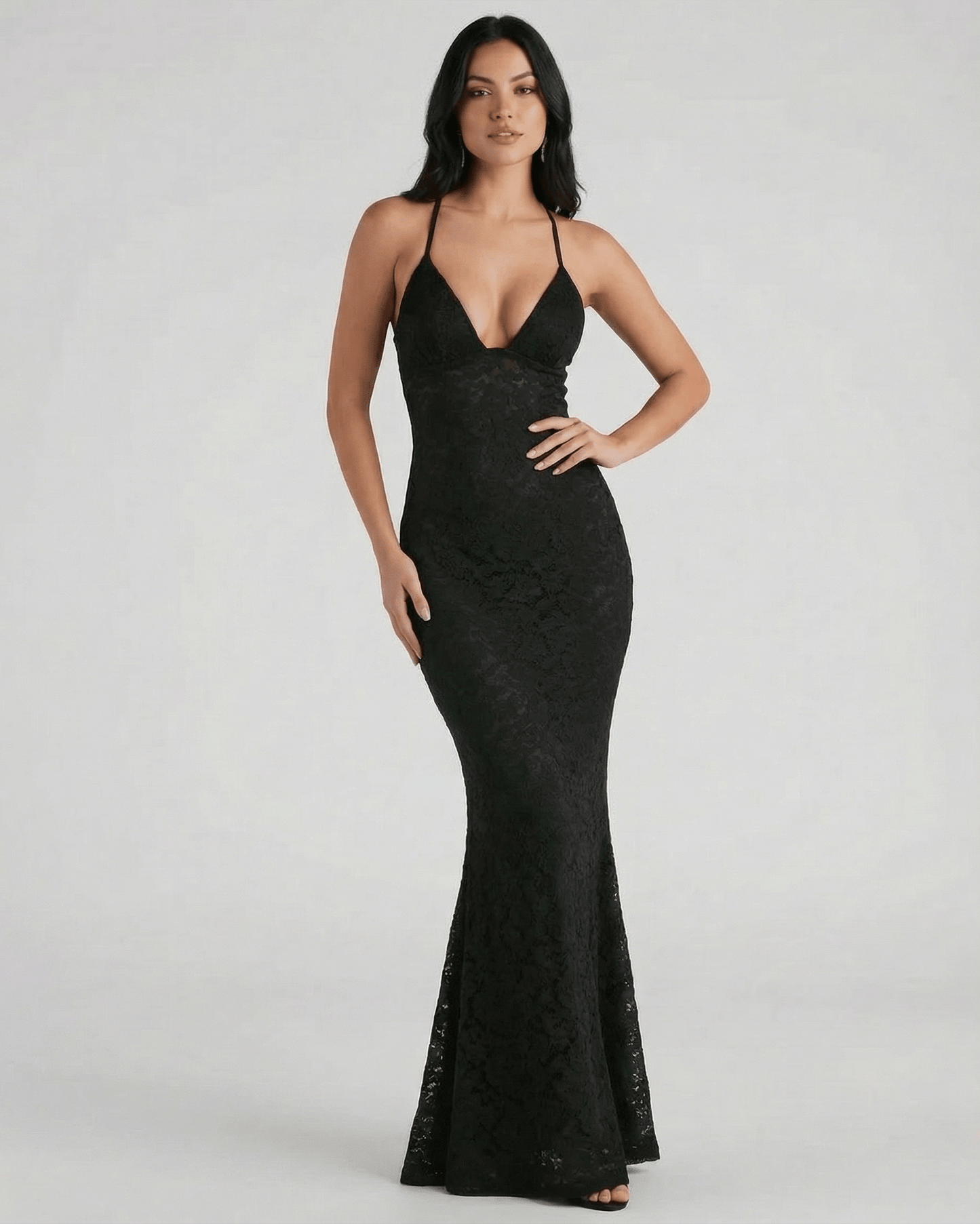 Nyx Maxi Dress by Lauven showcasing a sleek black lace V-neck trumpet silhouette, perfect for elegant occasions.