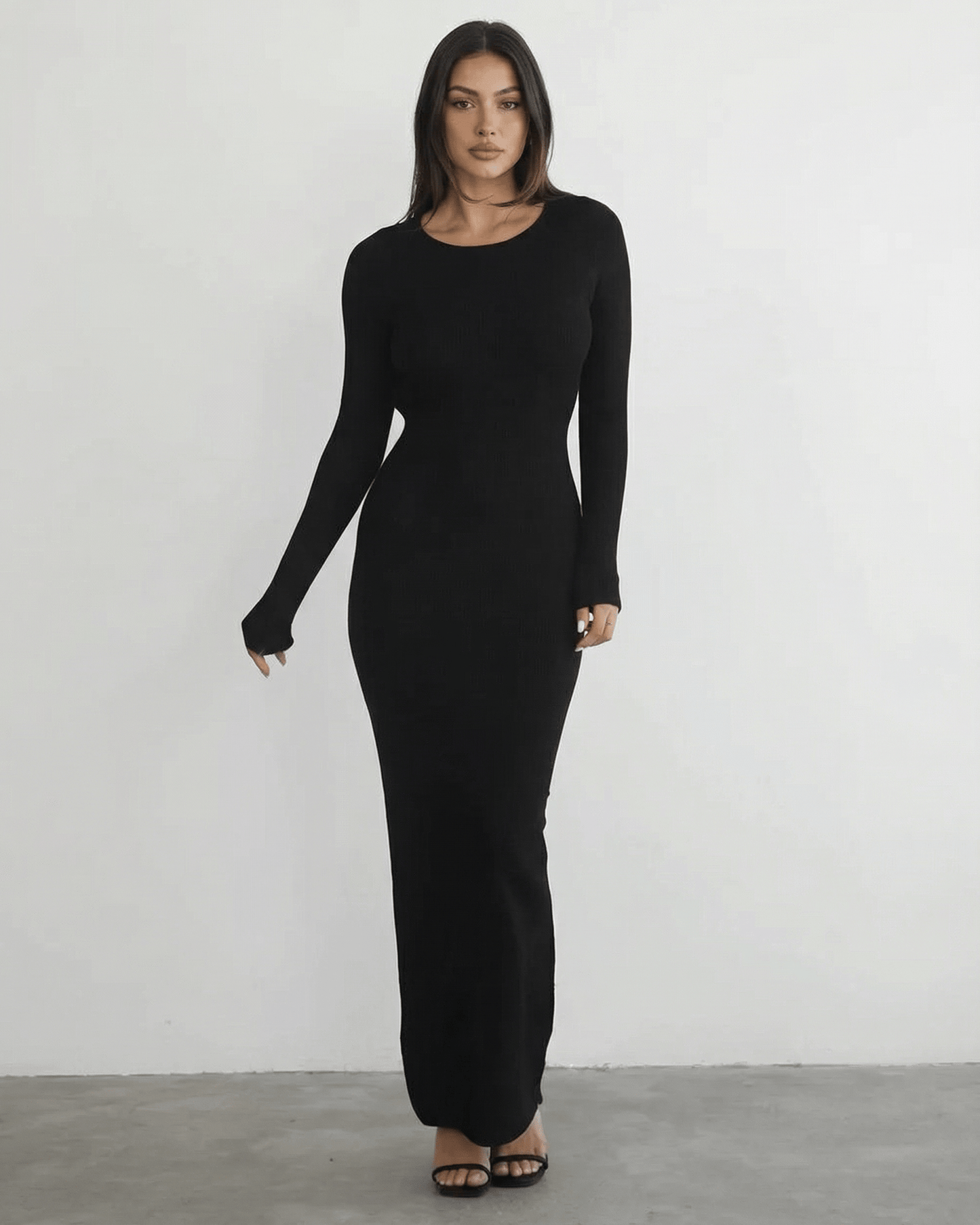 Nyx Maxi Dress by Lauven featuring a long sleeve black design and sleek pencil silhouette.