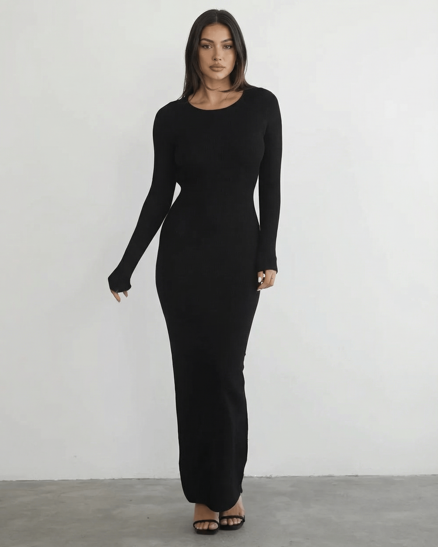 Nyx Maxi Dress by Lauven featuring a long sleeve black design and sleek pencil silhouette.