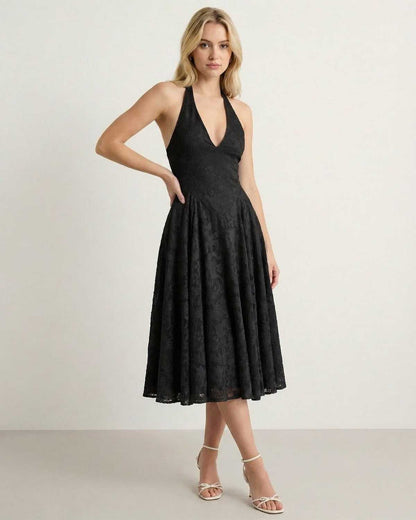 Lauven Nyx Midi Dress - Timeless black A-line halter gown with jacquard texture and V-neckline, perfect for any occasion.