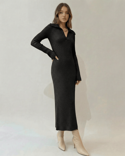 Model wearing the Nyx Midi Dress by Lauven, featuring a ribbed knit V-neck design and long sleeves.