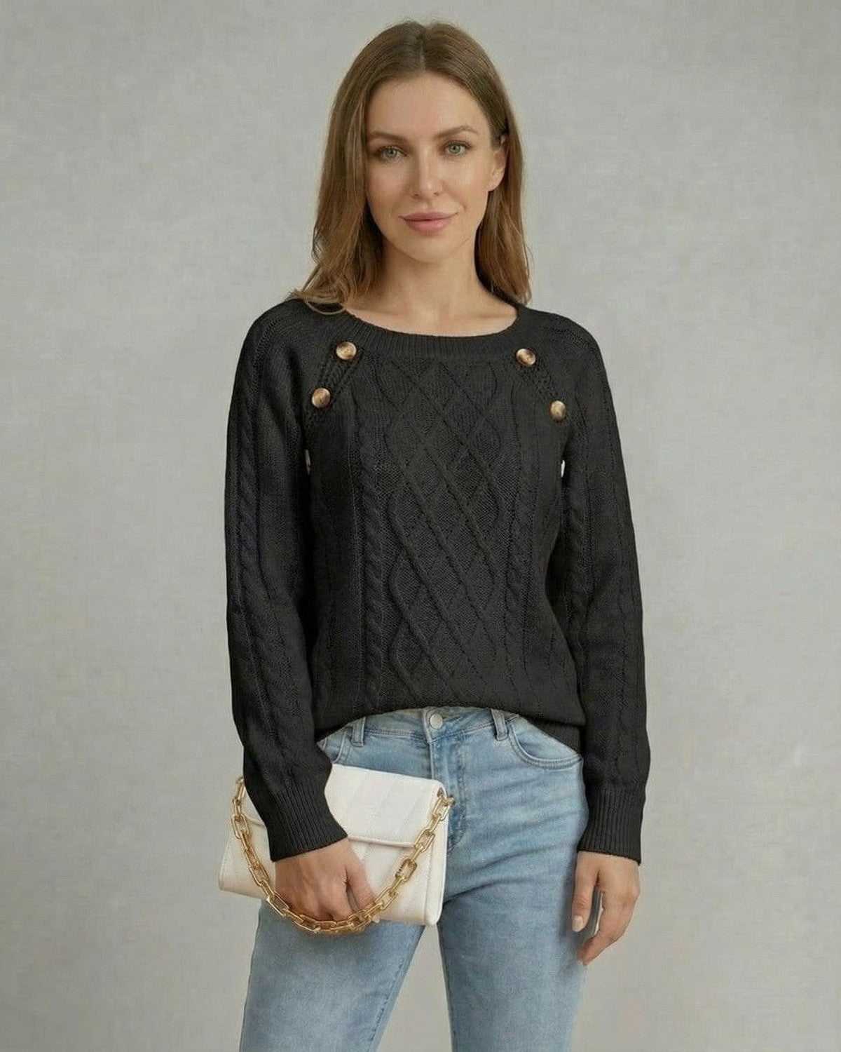 Nyx Pullover by Lauven featuring a cable knit design in black with a square collar and buttons on the shoulders.