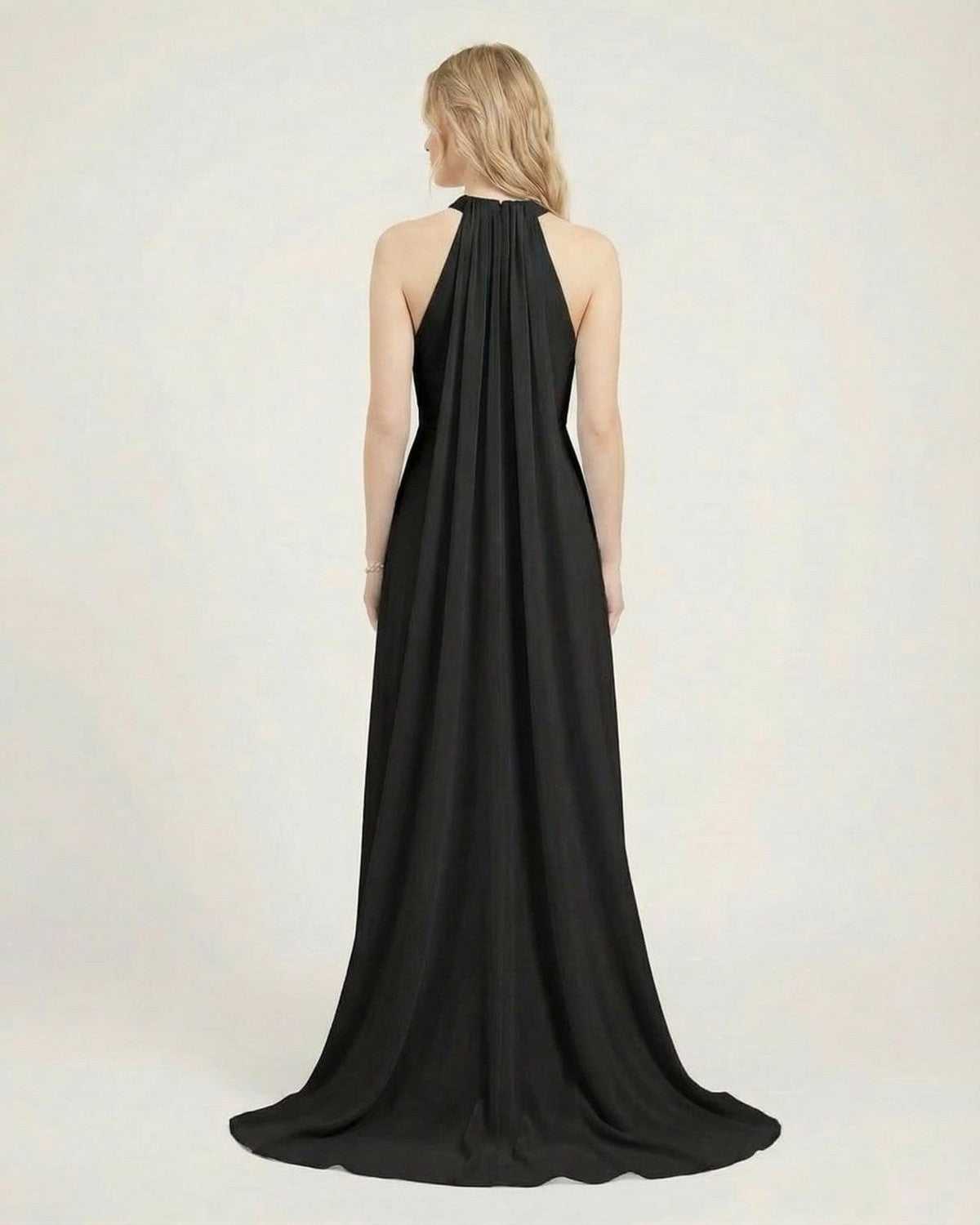 Back view of Lauven Obsidian Maxi Dress, a black halter neck sleeveless maxi dress with a loose fit.