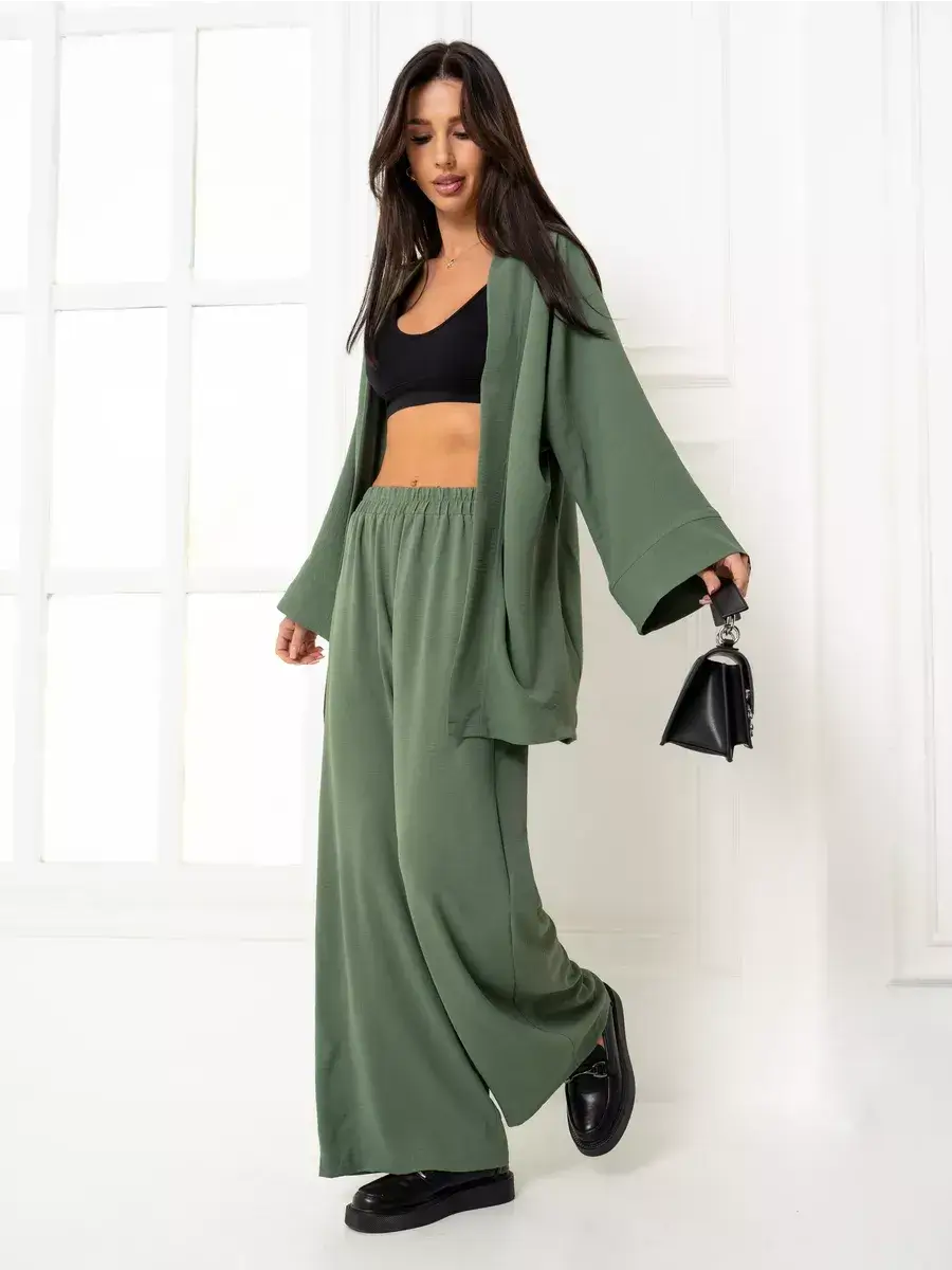 Olive Suit Set by Lauven featuring an elegant oversized two-piece set in soft green with wide-leg trousers.