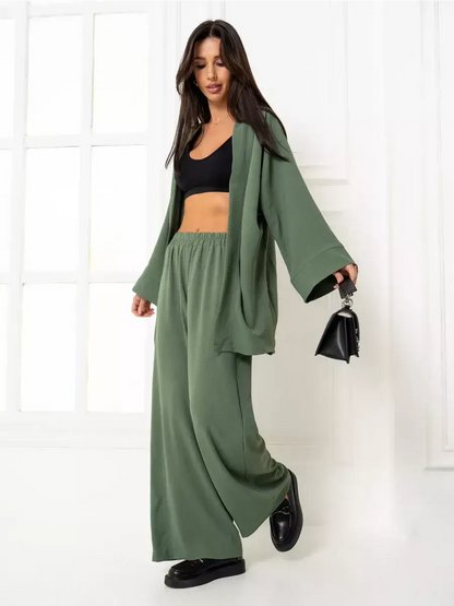 Olive Suit Set by Lauven featuring an elegant oversized two-piece set in soft green with wide-leg trousers.