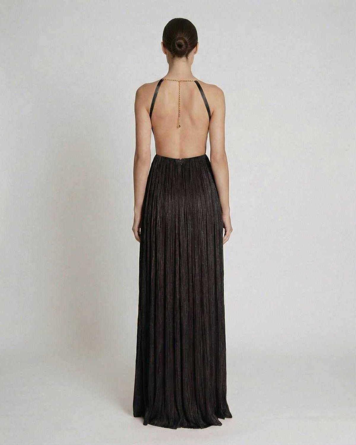 Back view of Lauven Onyx Maxi Dress showcasing halter neckline and pleated sheath silhouette.