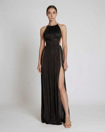 Onyx Maxi Dress by Lauven featuring a pleated sheath silhouette and halter neckline, showcasing elegant movement and a slim fit.