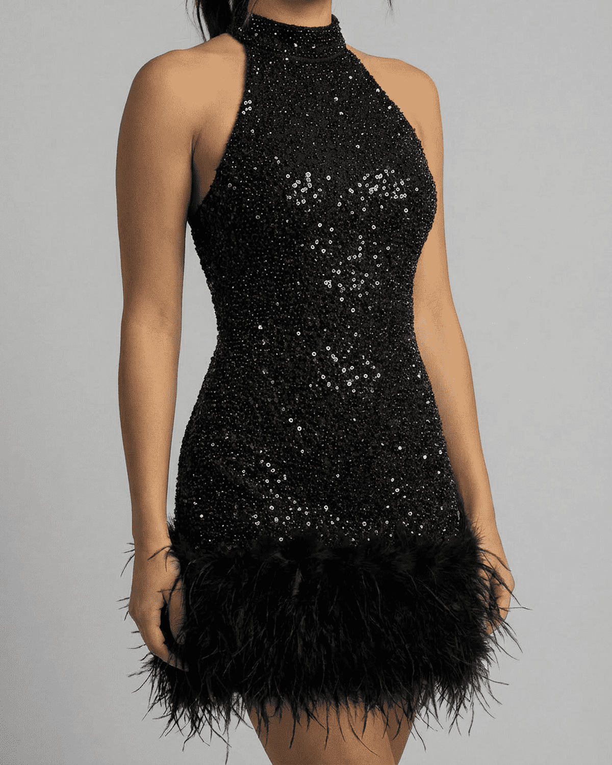 Onyx Mini Dress by Lauven - Black sequin halter bodycon mini dress with fuzzy hem, showcasing sleek silhouette and shimmer.