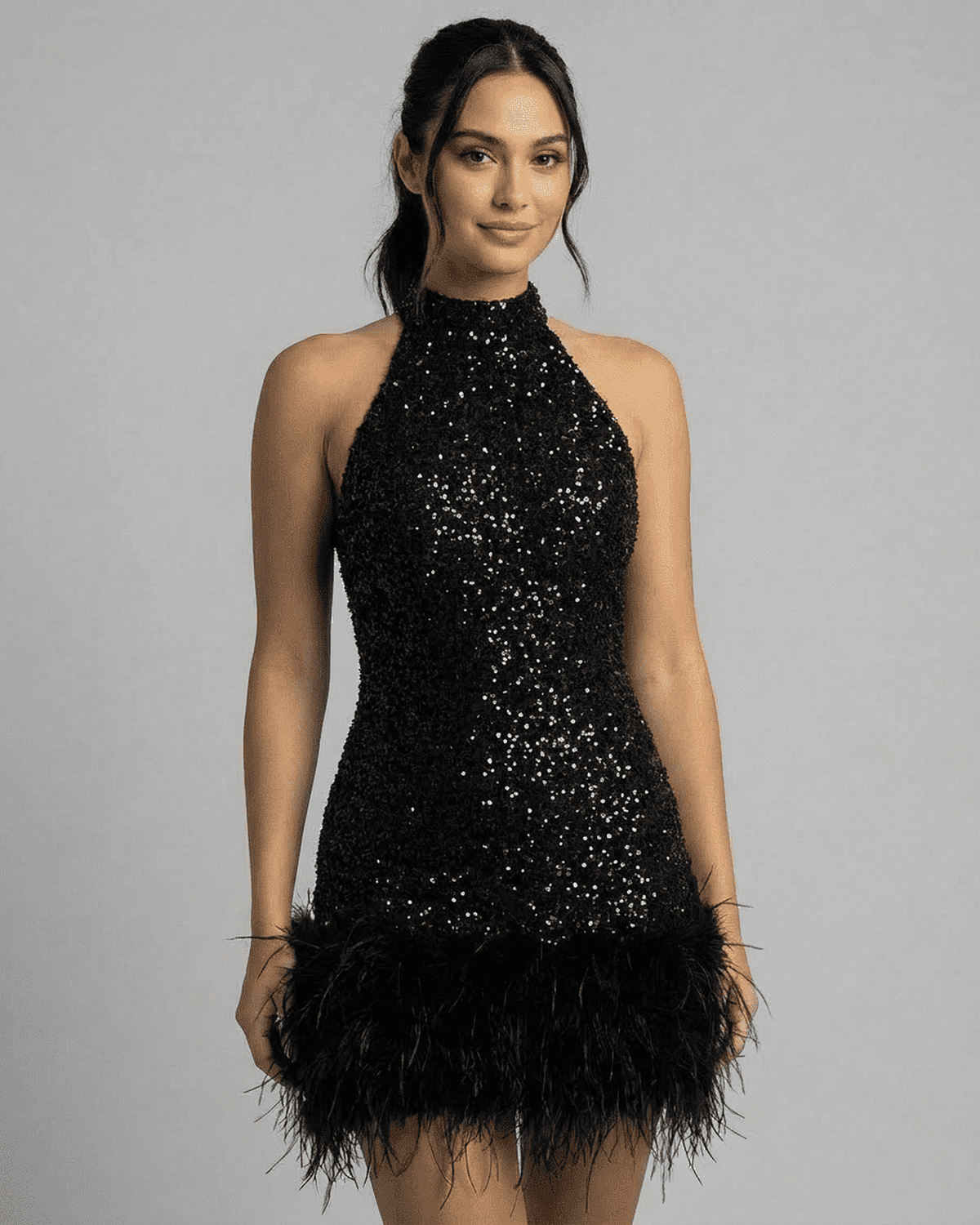 Onyx Mini Dress by Lauven - Black sequin halter bodycon with fuzzy hem, showcasing a sleek silhouette.
