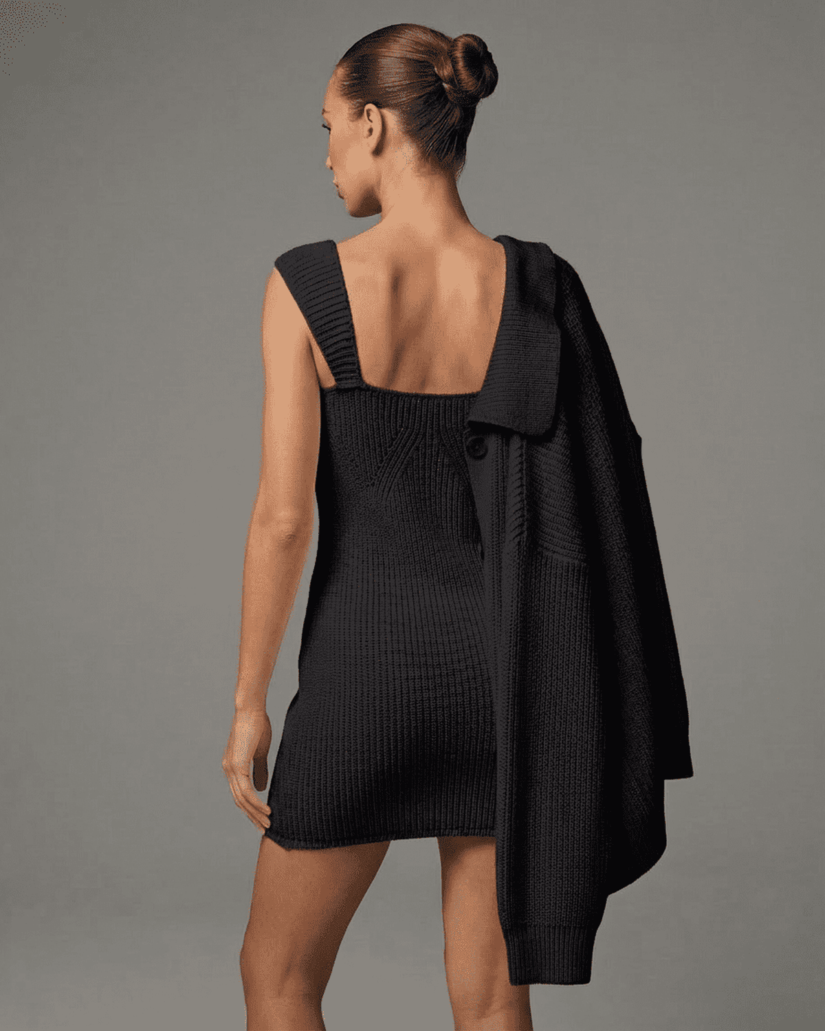 Onyx Mini Dress by Lauven - Sleek knit bodycon mini dress in classic black with sleeveless design.
