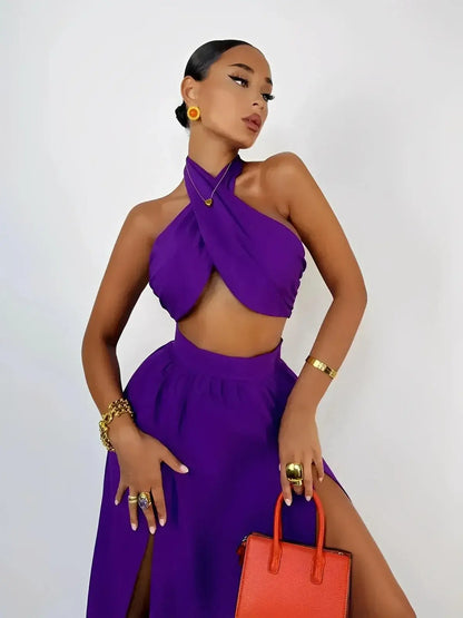 Orchid Drape Set by Lauven featuring a purple halter top and high-slit maxi skirt, perfect for summer fashion.