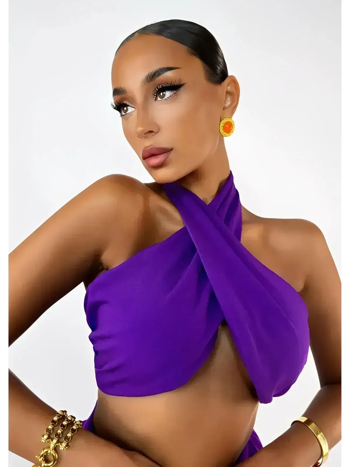Orchid Drape Set by Lauven featuring a halter top in vibrant purple, designed to flatter and captivate.