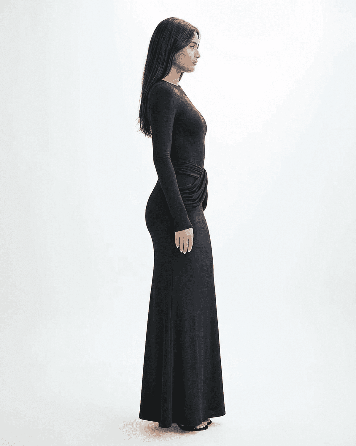 Orion Maxi Dress by Lauven featuring a long sleeve crew neck silhouette with ruched detail and a sleek black finish.
