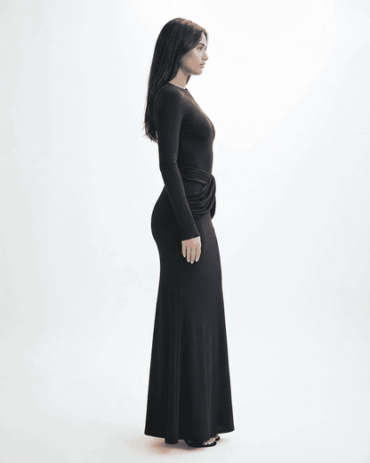 Orion Maxi Dress by Lauven featuring a long sleeve crew neck silhouette with ruched detail and a sleek black finish.