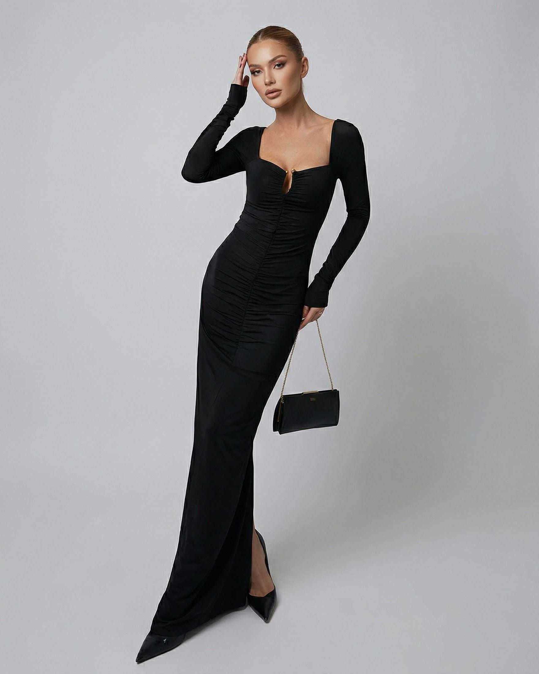Model wearing Lauven Orion Maxi Dress, a sleek black long sleeve dress featuring a high-waist silhouette.