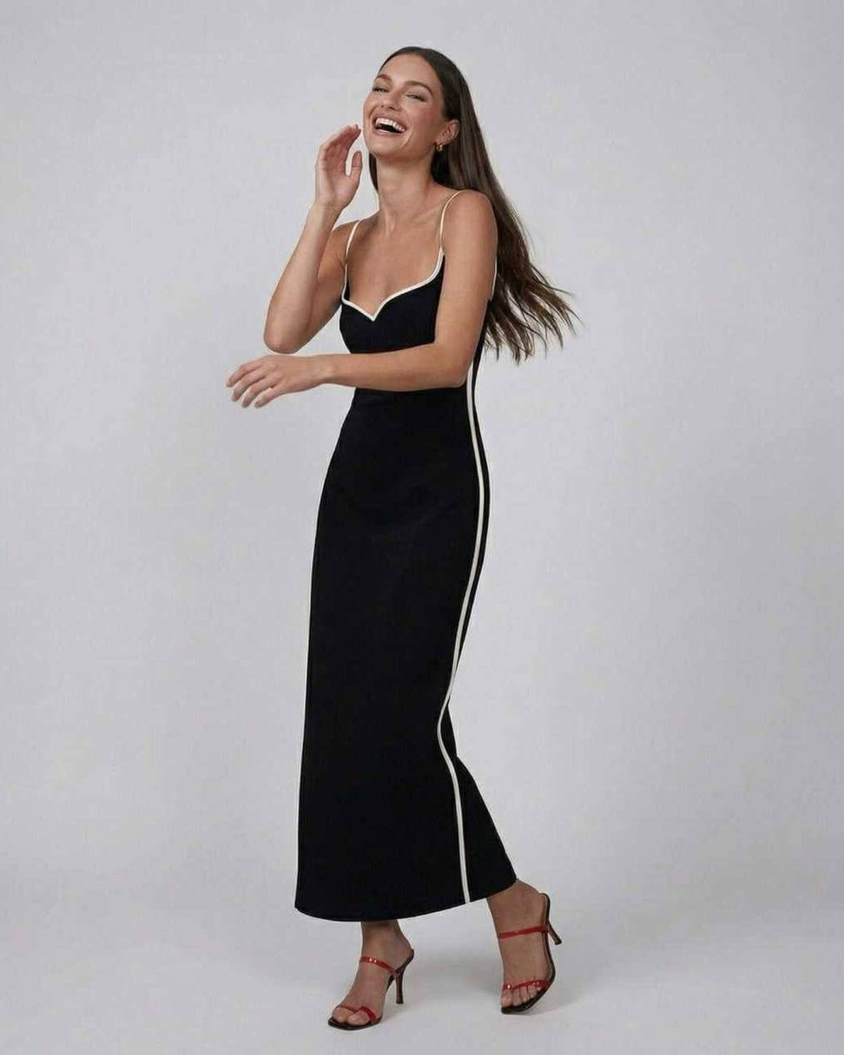 Orion Midi Dress by Lauven - Elegant black slim fit dress with contrast piping, showcasing timeless style and modern sophistication.