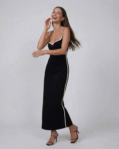 Orion Midi Dress by Lauven - Elegant black slim fit dress with contrast piping, showcasing timeless style and modern sophistication.