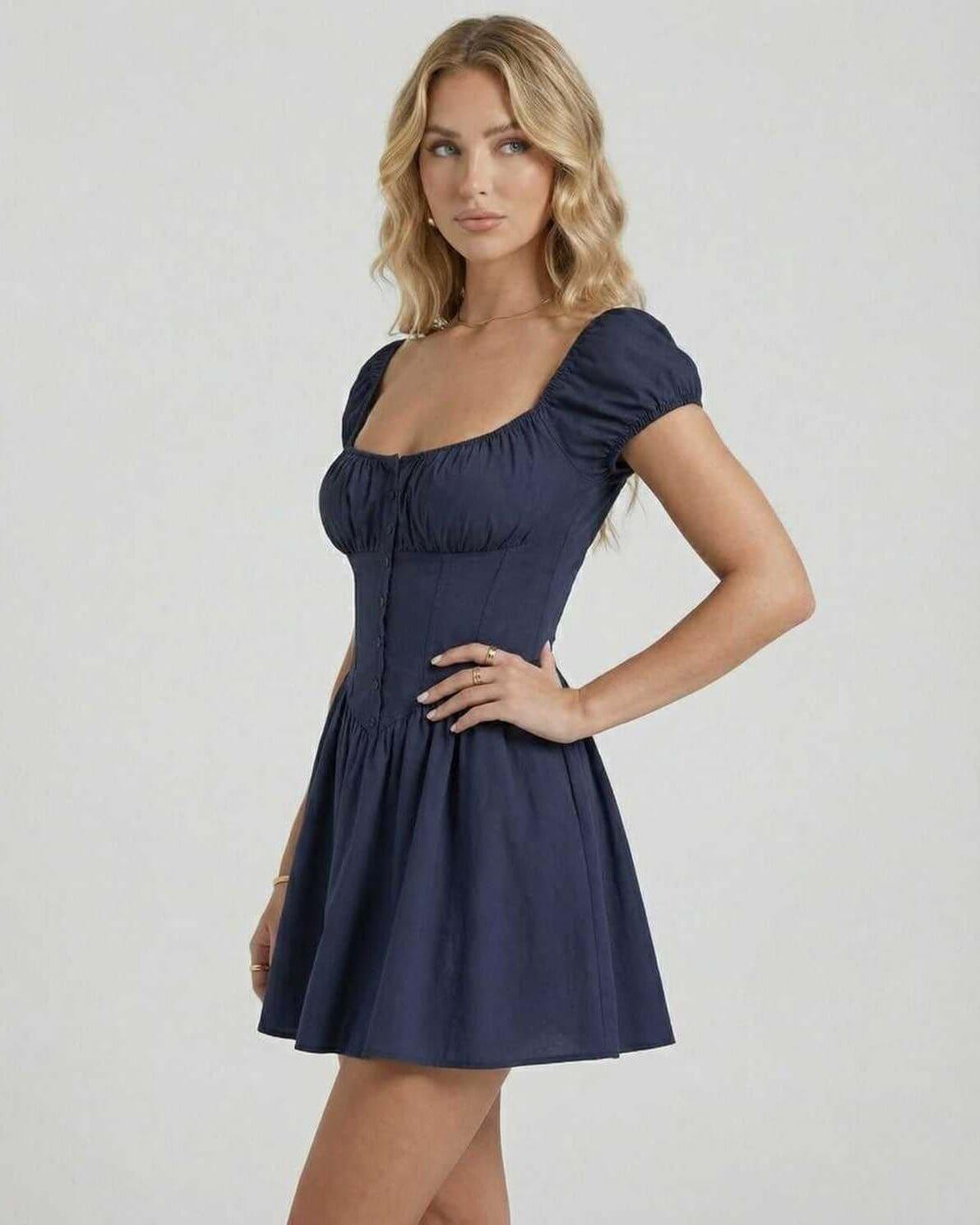 Orion Mini Dress by Lauven in deep navy with puff sleeves, showcasing elegant fit and flare silhouette.