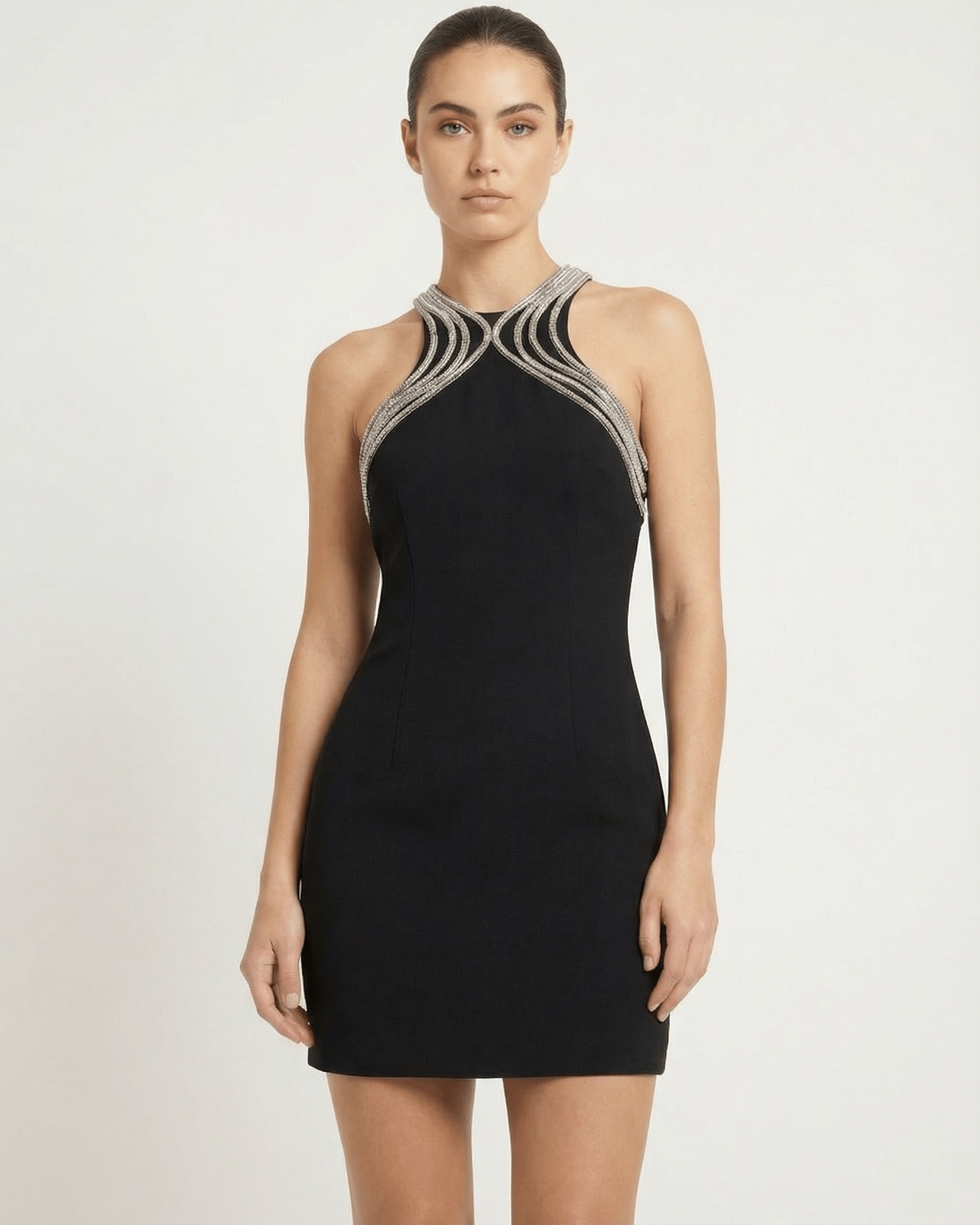 Orion Mini Dress by Lauven, sleeveless sheath mini dress with embellished O-neck and metallic trim.
