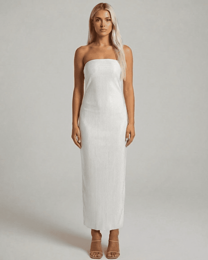 Lauven Pearl Maxi Dress featuring a strapless tube silhouette and subtle ruched texture for a modern, elegant look.
