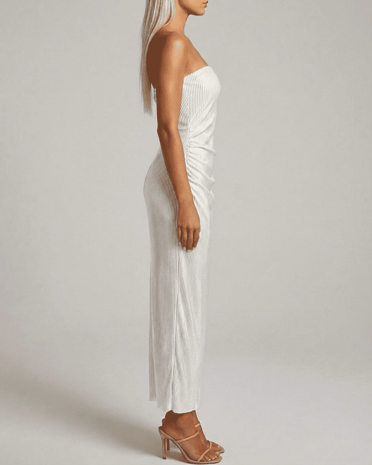 Pearl Maxi Dress by Lauven showcasing a strapless tube silhouette and subtle ruched texture for a modern elegance.