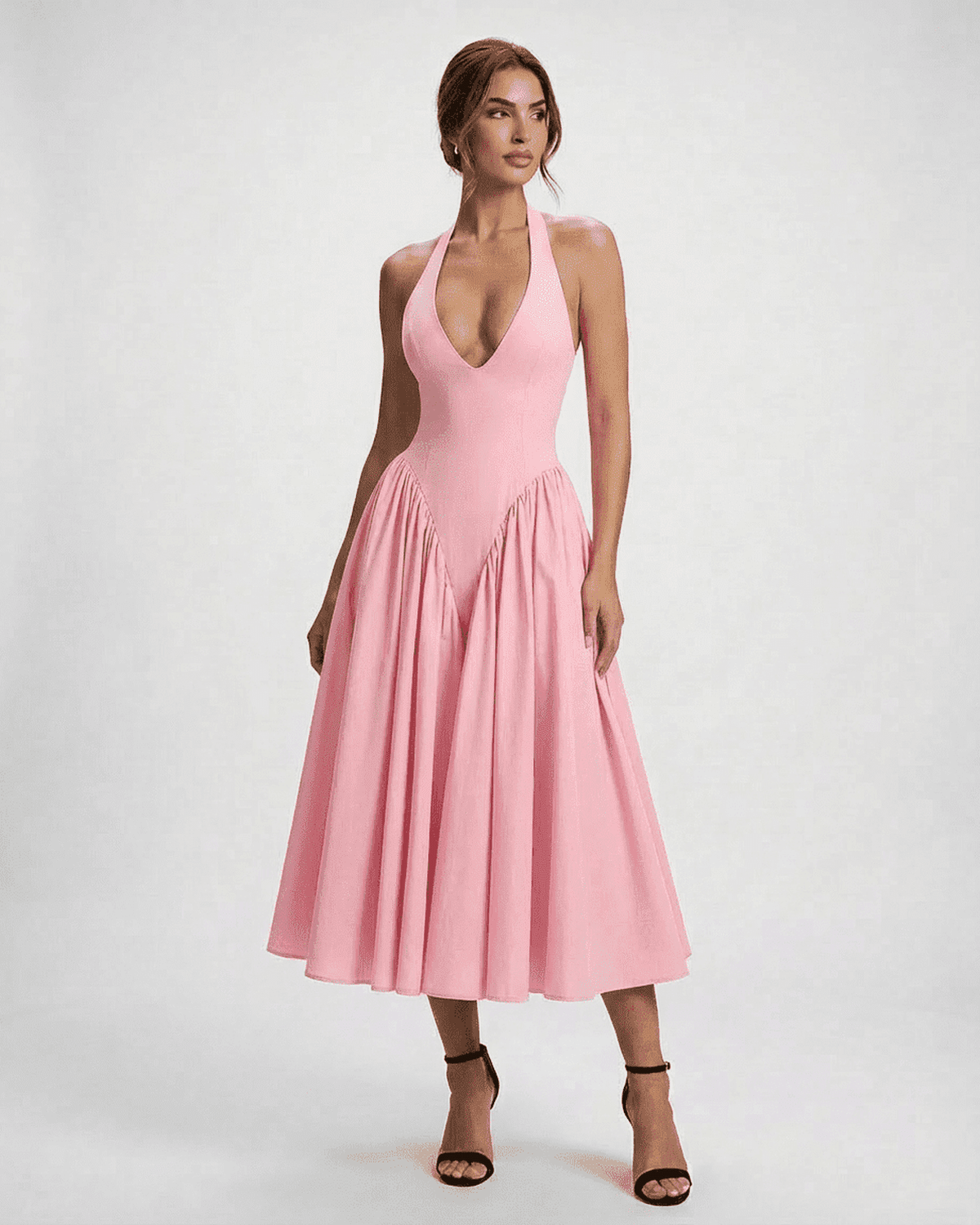 Pink Celeste Midi dress by Lauven featuring a halter neck design and flowing A-line silhouette.