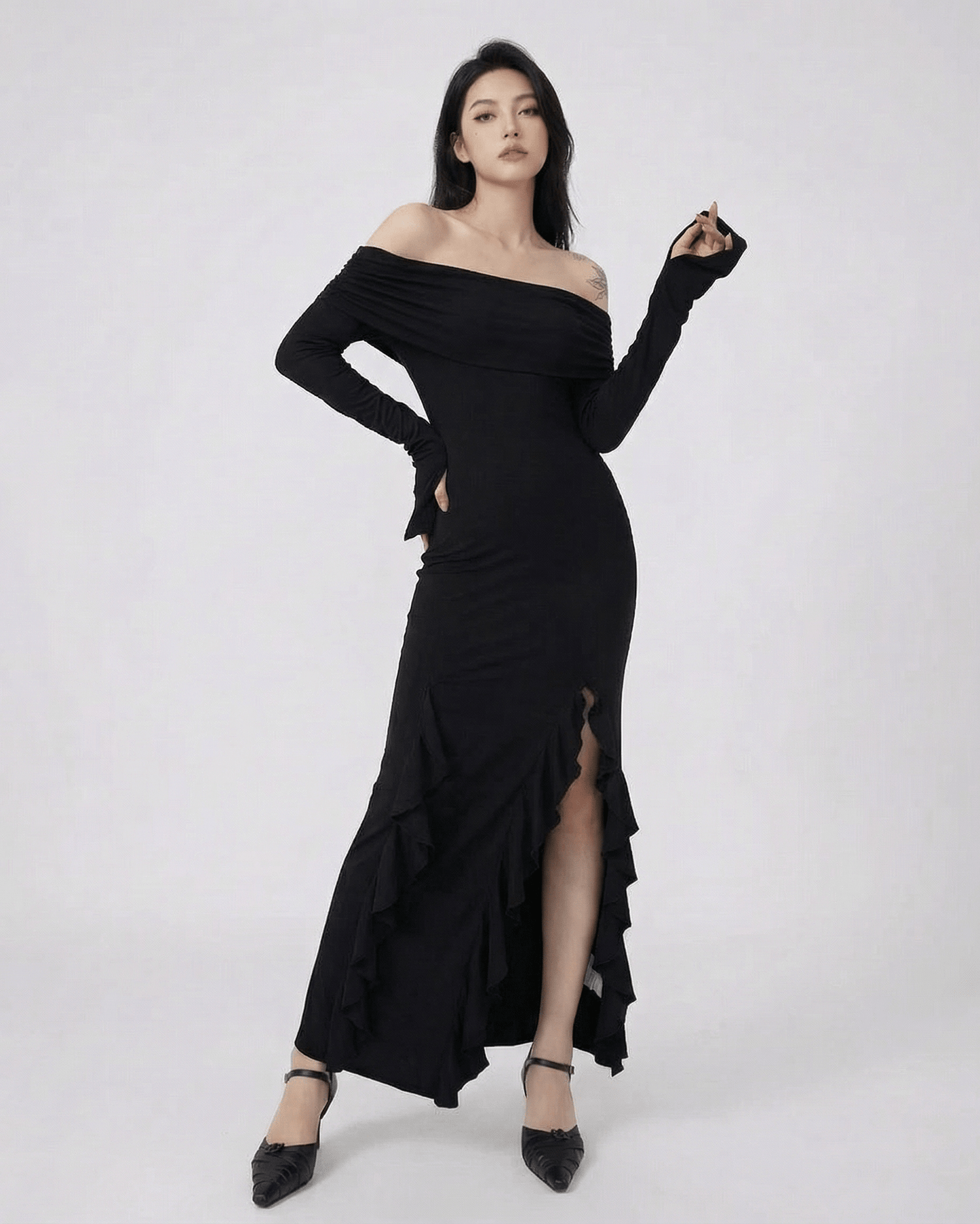 Raven Maxi Dress by Lauven - Off-Shoulder Asymmetrical Ruffle Dress with Flare Sleeves in black.
