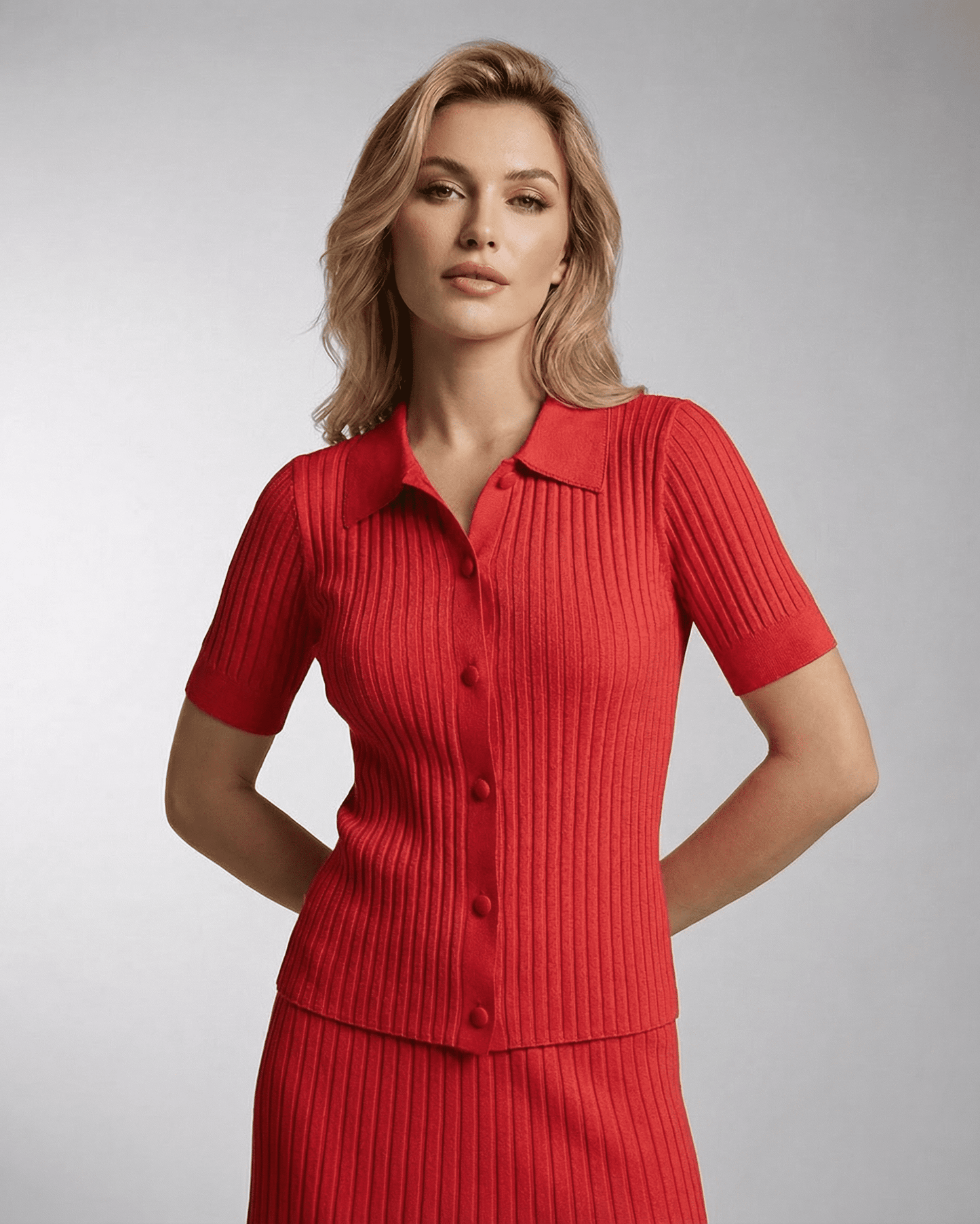Riviera Polo Shirt by Lauven, women's slim knit polo shirt in vibrant red with fine rib texture.