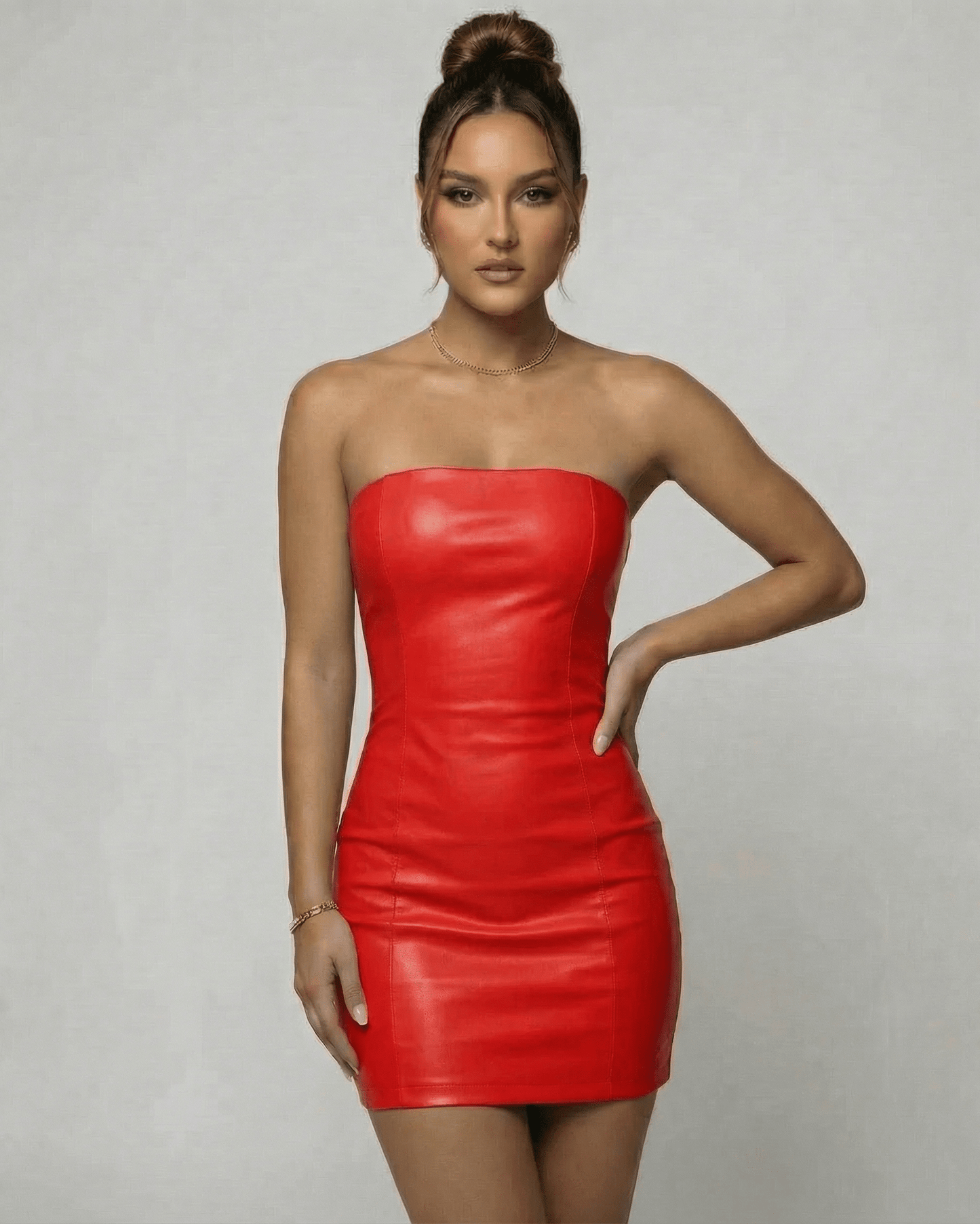 Roma Mini Dress by Lauven - Strapless red PU pencil mini dress showcasing a sleek, modern silhouette.