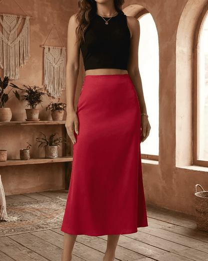 Rosalia Midi Skirt by Lauven – Elegant red satin mermaid midi skirt showcasing a modern feminine silhouette.