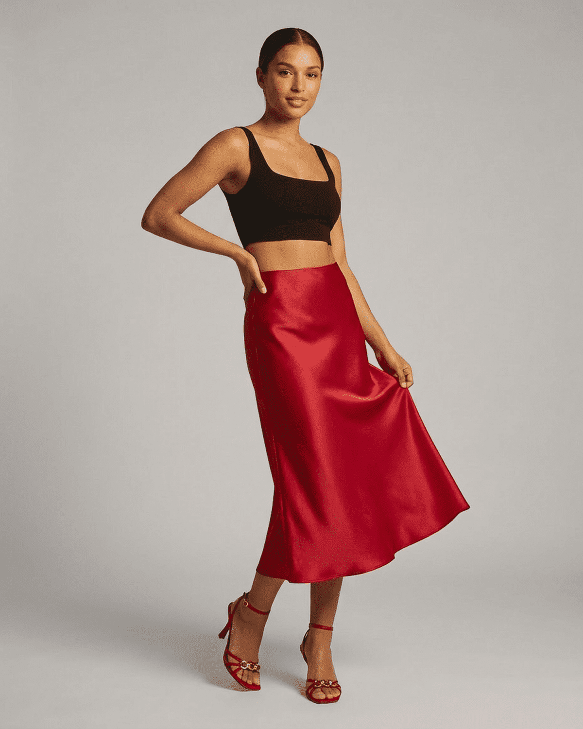 Rosalia Midi Skirt by Lauven showcasing a satin mermaid design in red for an elegant look.