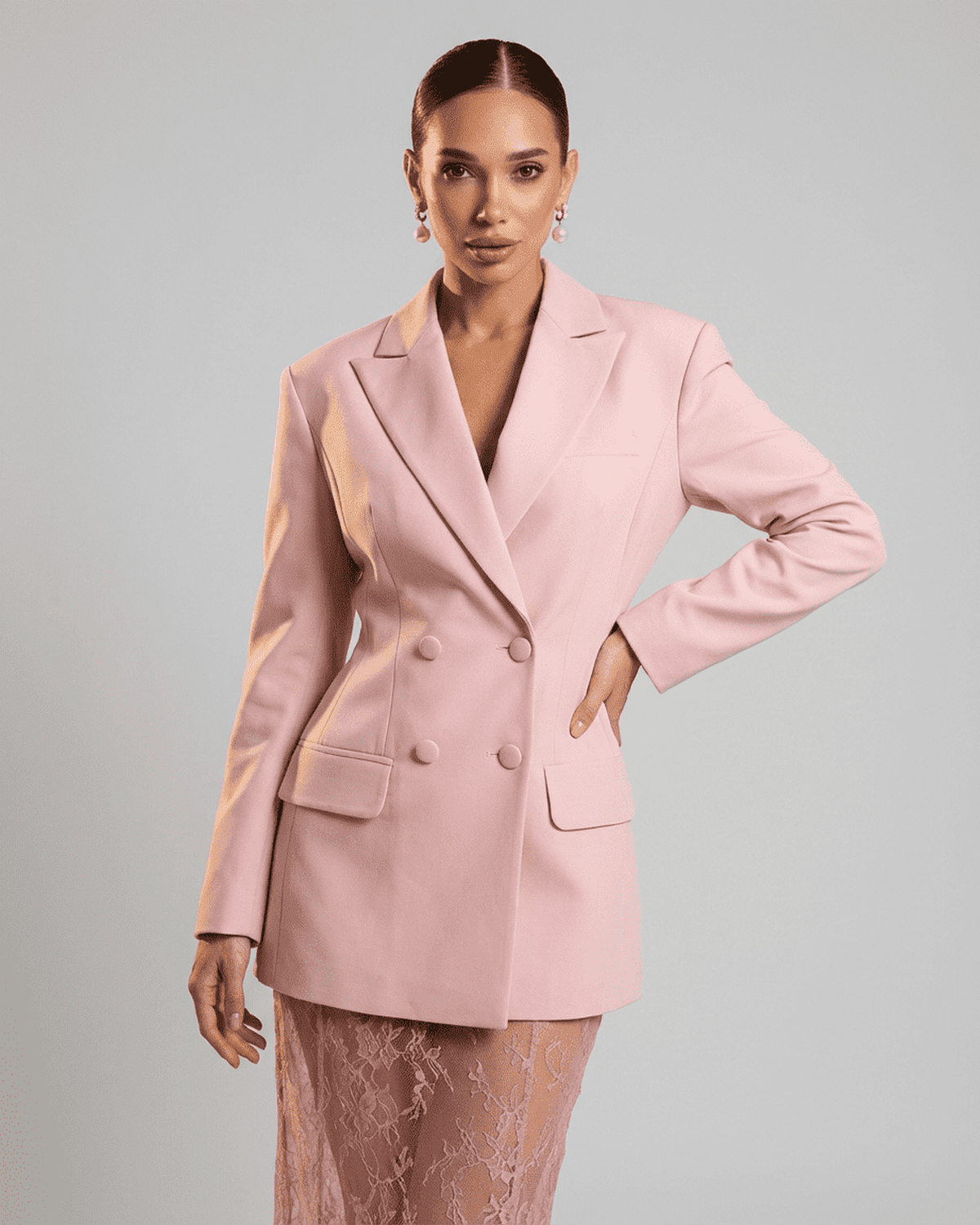 Rosalie Blazer by Lauven, a pink double-breasted women's blazer showcasing a tailored silhouette and sharp lapels.