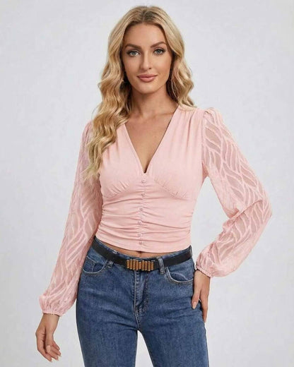 Rosalie Pullover by Lauven – Women's pink V-neck long sleeve pullover with lantern sleeves and patchwork design.