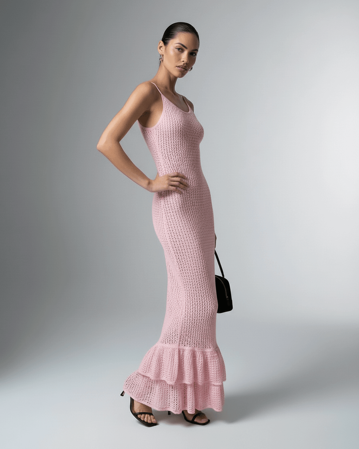 Rosaline Maxi Dress by Lauven – Pink bodycon maxi dress with hollow out knit texture and flared hem.