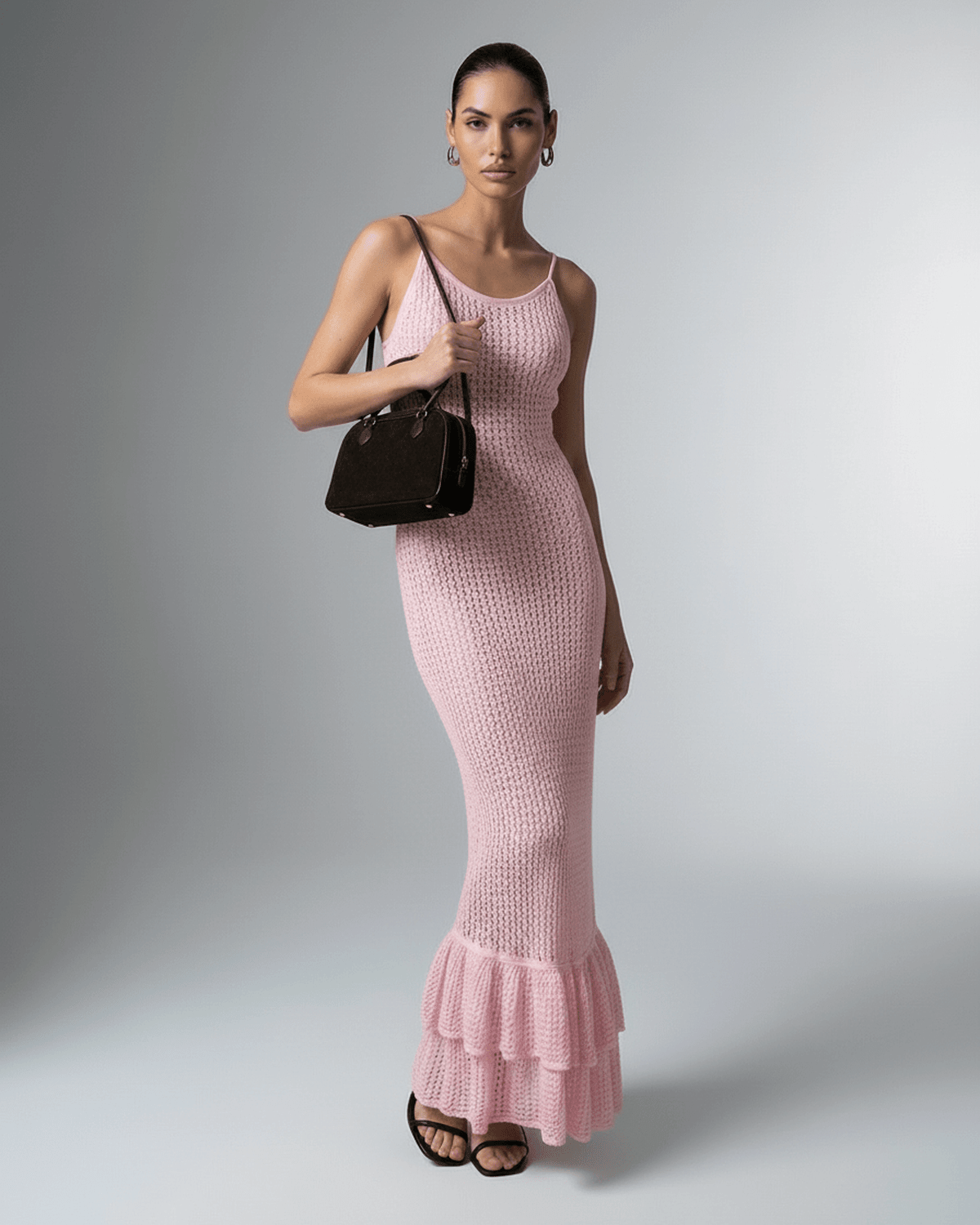 Rosaline Maxi Dress by Lauven – Pink bodycon maxi dress with hollow out knit design and ruffled hem.