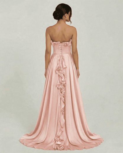 Rosalyn Maxi Dress by Lauven, elegant strapless pink maxi dress with ruffle detail, back view.