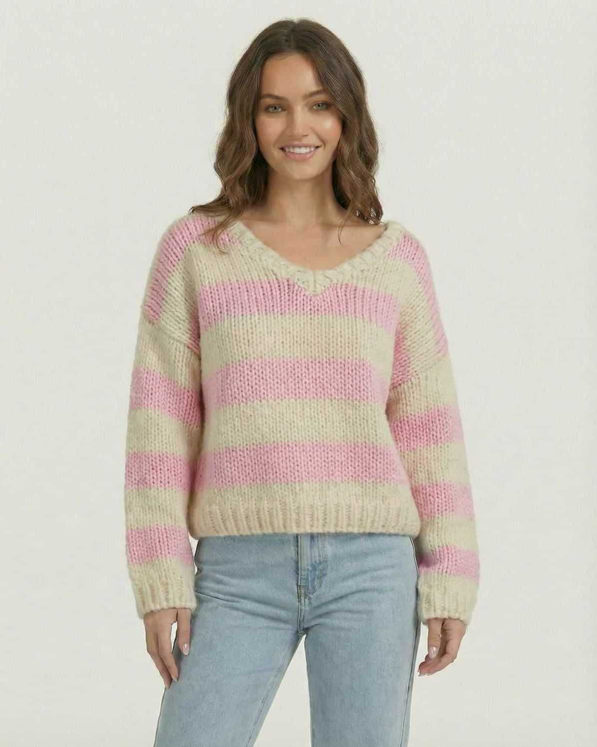 Rosé Pullover by Lauven, a women’s striped V-neck knit sweater in soft pink and ivory colors.