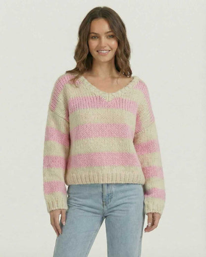Rosé Pullover by Lauven, a women’s striped V-neck knit sweater in soft pink and ivory colors.