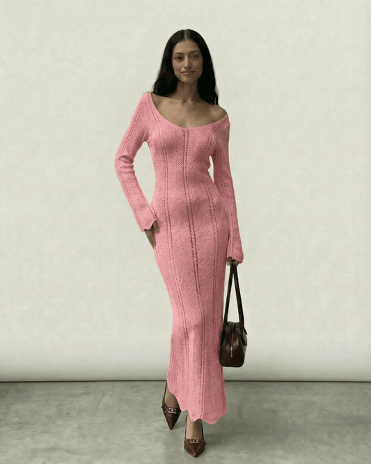 Roselle Maxi Dress from Lauven, featuring a ribbed bodycon design in soft pink with a V-neckline and long flare sleeves.