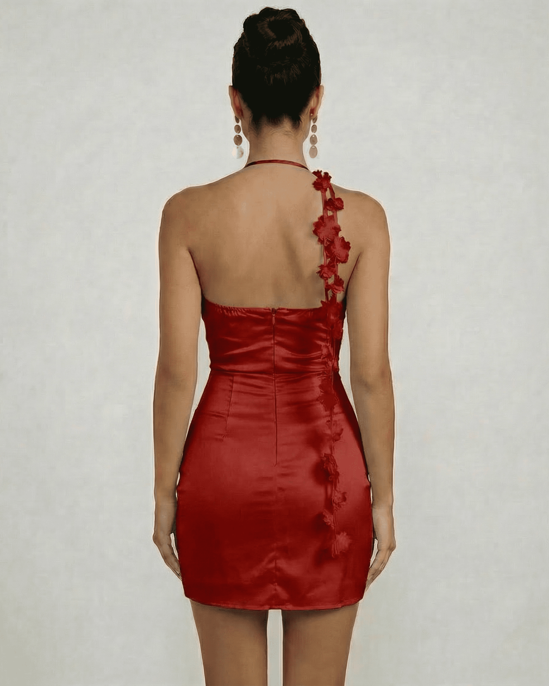 Back view of the Roselyn Mini Dress by Lauven featuring floral detailing and a sleek silhouette.