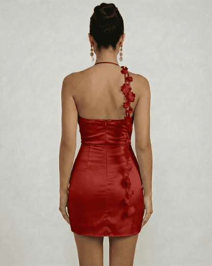 Back view of the Roselyn Mini Dress by Lauven featuring floral detailing and a sleek silhouette.